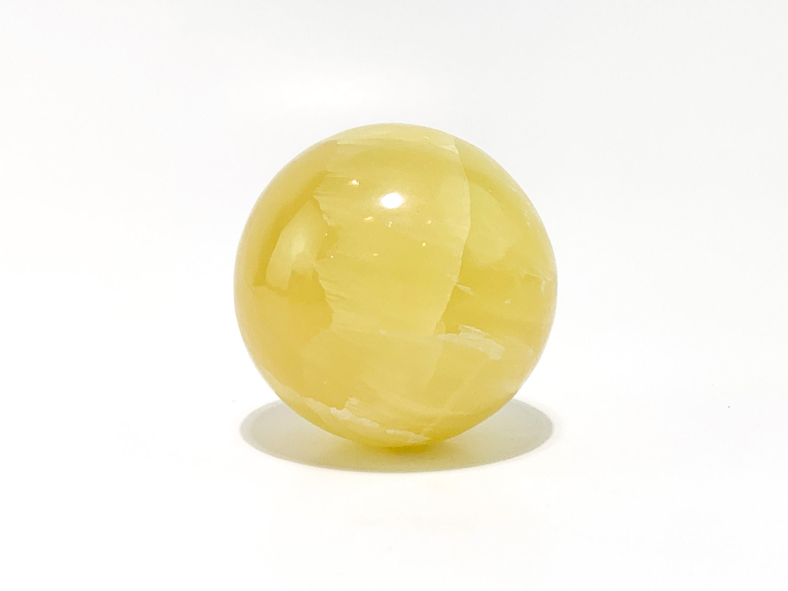 Radiant Lemon Calcite Sphere: Healing Crystal Home Decor
