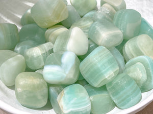 Pistachio Calcite Tumbled Stones : Nature's Green Wonder
