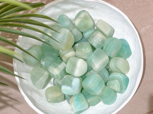 Pistachio Calcite Tumbled Stones : Nature's Green Wonder