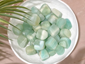 Pistachio Calcite Tumbled Stones : Nature's Green Wonder