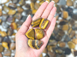 Tiger Eye Tumbled Crystals: Enhance Your Life with the Power of Manifestation and Healing