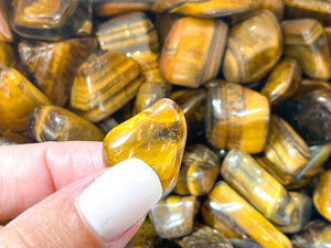 Tiger Eye Tumbled Crystals: Enhance Your Life with the Power of Manifestation and Healing