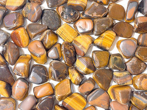 Tiger Eye Tumbled Crystals: Enhance Your Life with the Power of Manifestation and Healing