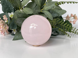 Mangano Calcite Crystal Sphere : A UV-Reactive Pink Crystal for Healing and Harmony