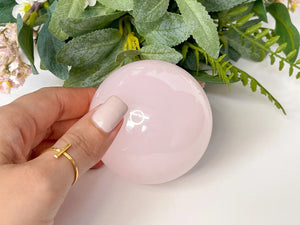 Mangano Calcite Crystal Sphere : A UV-Reactive Pink Crystal for Healing and Harmony