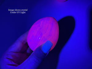 UV-Reactive Mangano Calcite Crystal Egg: Egg-cellent Addition to Your Crystal Collection