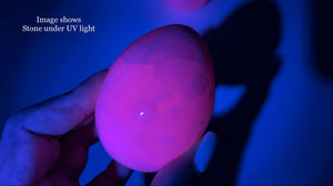 UV-Reactive Mangano Calcite Crystal Egg: Egg-cellent Addition to Your Crystal Collection