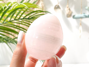 UV-Reactive Mangano Calcite Crystal Egg: Egg-cellent Addition to Your Crystal Collection