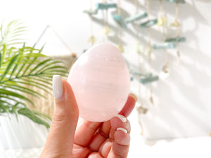 UV-Reactive Mangano Calcite Crystal Egg: Egg-cellent Addition to Your Crystal Collection