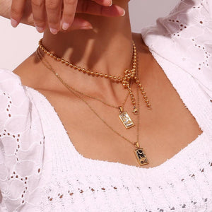 The Lovers Tarot Card Necklace: 18K Gold Plated Pendant, Mother of Pearl & Crystal