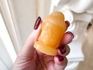 Orange Calcite Buddha Head – 5 cm – Positivity, Creativity & Confidence Boost