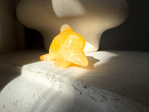Hand Carved Orange Calcite Dolphin Figurine: Healing Crystal Decor (3")