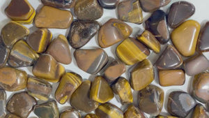 Tiger Eye Tumbled Crystals: Enhance Your Life with the Power of Manifestation and Healing