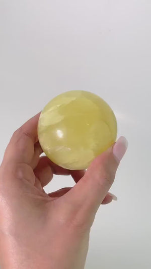Radiant Lemon Calcite Sphere: Healing Crystal Home Decor