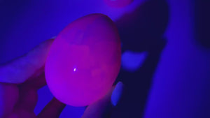 UV-Reactive Mangano Calcite Crystal Egg: Egg-cellent Addition to Your Crystal Collection